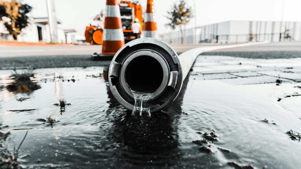Water flowing out of a drain pipe